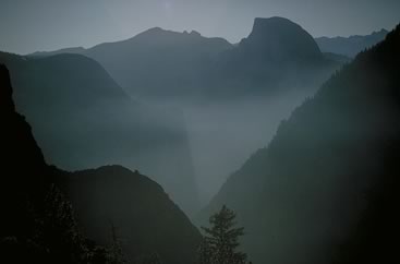 El Cap looking toward Half Dome across a foggy morning in Yosemite El Cap looking toward Half Dome across a foggy morning in Yosemite The Yosemite Valley Copyright Brad Carlile